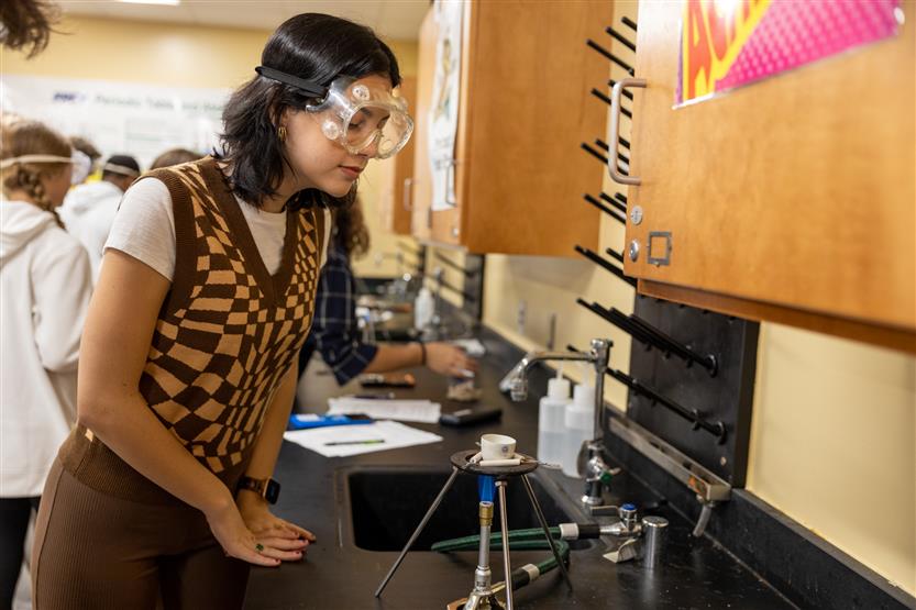 A girl does a science experiment
